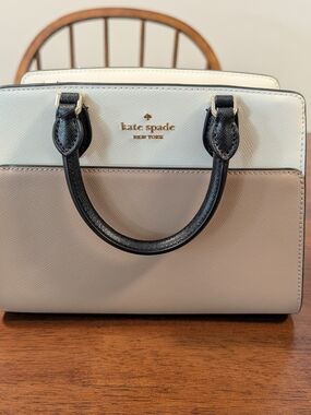 kate spade two-tone cream and beige satchel with black handles